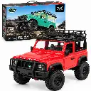 Defender rojo junto a su caja 4x4.webp